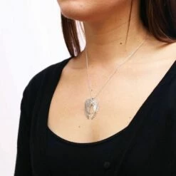 Equilibrium Clear 3D Guardian Angel Wings Necklace 5 Equilibrium Clear 3D Guardian Angel Wings Necklace -gifts shop 64732 equilibrium clear 3d guardian angel wings necklace lifestyle 1