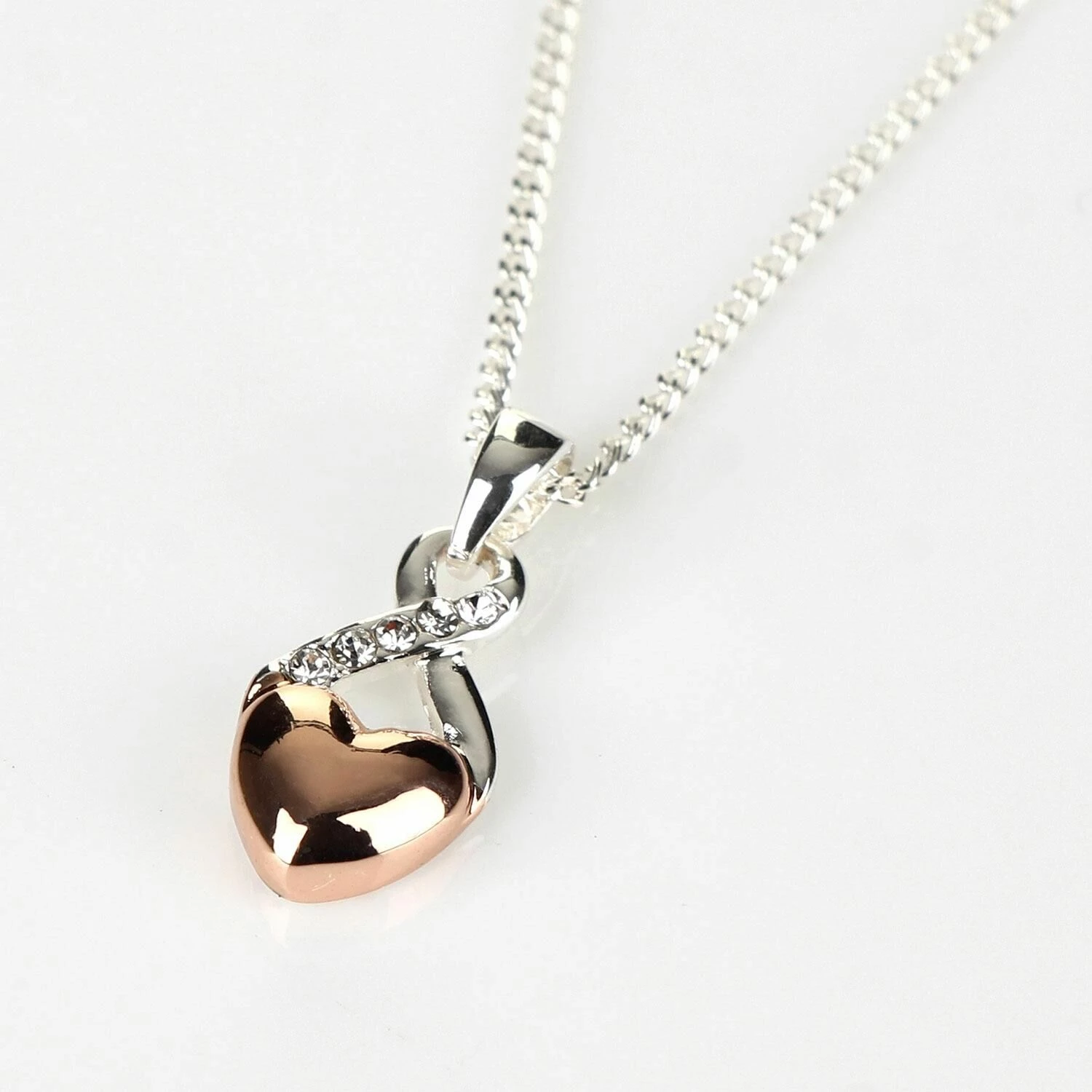 Equilibrium Two Tone Rose Gold Heart And Silver Kiss Necklace 1 Equilibrium Two Tone Rose Gold Heart And Silver Kiss Necklace