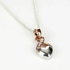 Equilibrium Two Tone Silver Heart And Rose Gold Kiss Necklace