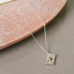 Equilibrium One In A Million Two Tone Envelope Necklace -gifts shop joe davies equilibrium 324253 sealed with a kiss two tone envelope necklace lifestyle 1