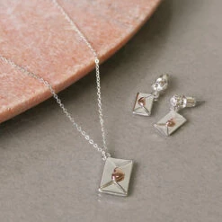 Equilibrium One In A Million Two Tone Envelope Necklace -gifts shop joe davies equilibrium sealed with a kiss two tone envelope jewellery set lifestyle 2