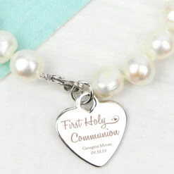 Personalised First Holy Communion Swirls & Hearts White Freshwater Pearl Bracelet -gifts shop p0102v73 pmc personalised first holy communion freshwater pearl bracelet 5