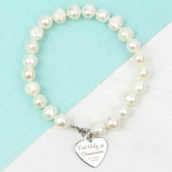 Personalised First Holy Communion Swirls & Hearts White Freshwater Pearl Bracelet -gifts shop p0102v73 pmc personalised first holy communion freshwater pearl bracelet 7